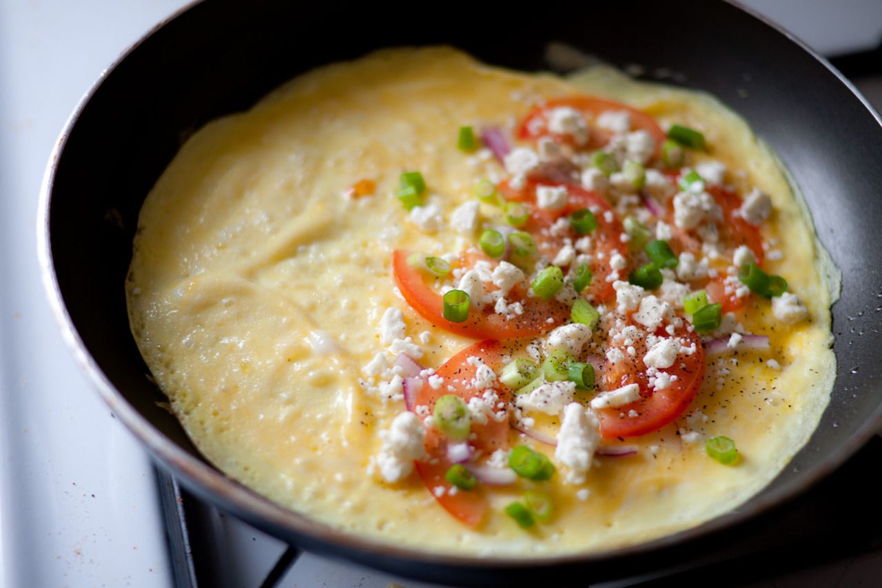 3 Egg Omelet With Red Onion Tomato Feta And Scallions Sided With