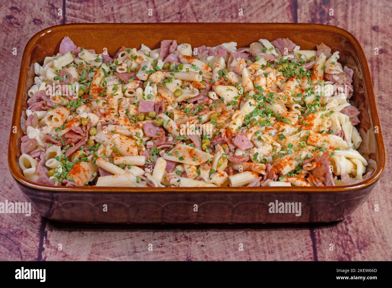 A Casserole Dish Filled With Noodles And Vegetables