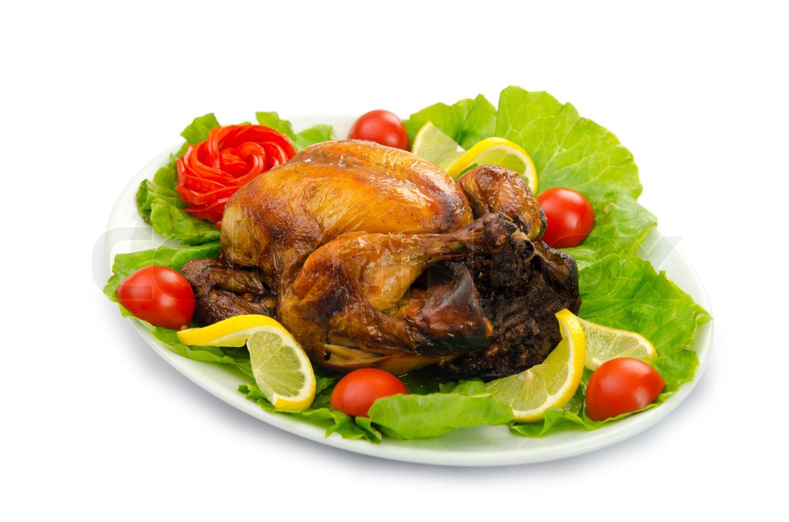 A Roasted Turkey Sitting On A Plate In The Kitchen