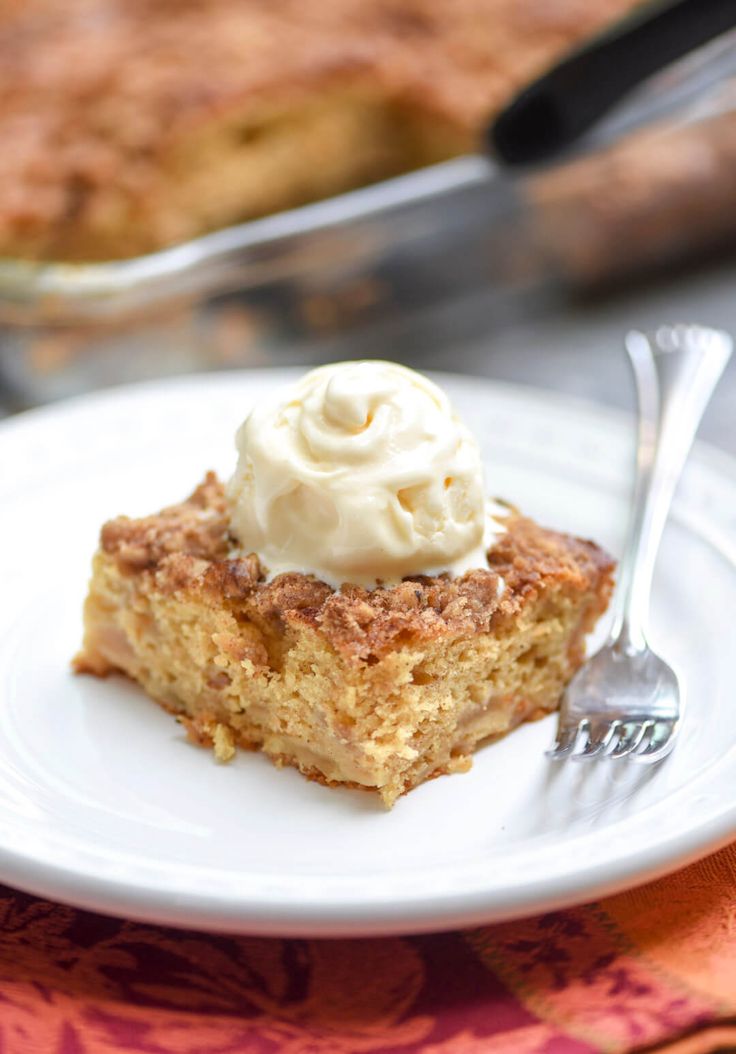 A Super Moist Cake That Is Studded With Apples And Topped With A Walnut