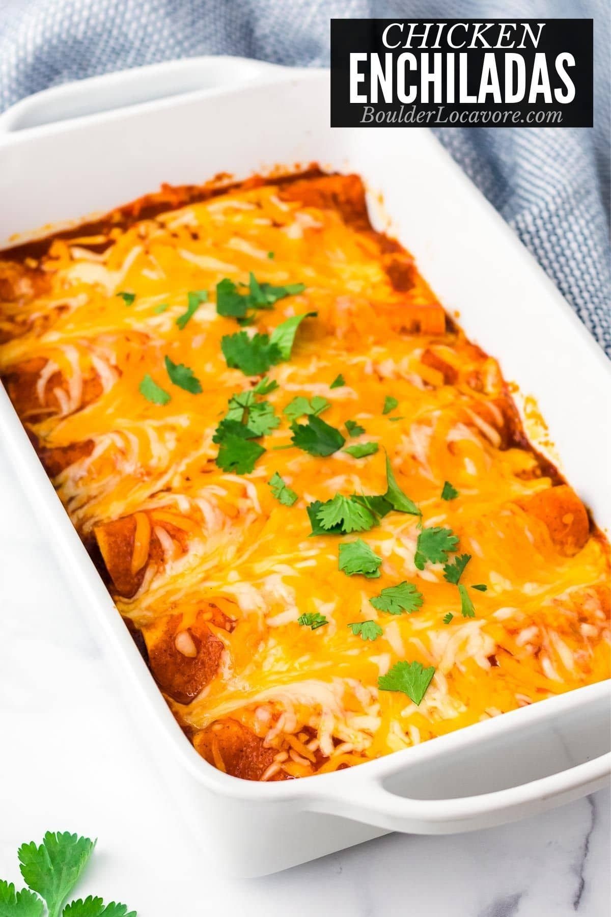 Authentic Chicken Enchiladas With Queso Fresco On A Blue Plate