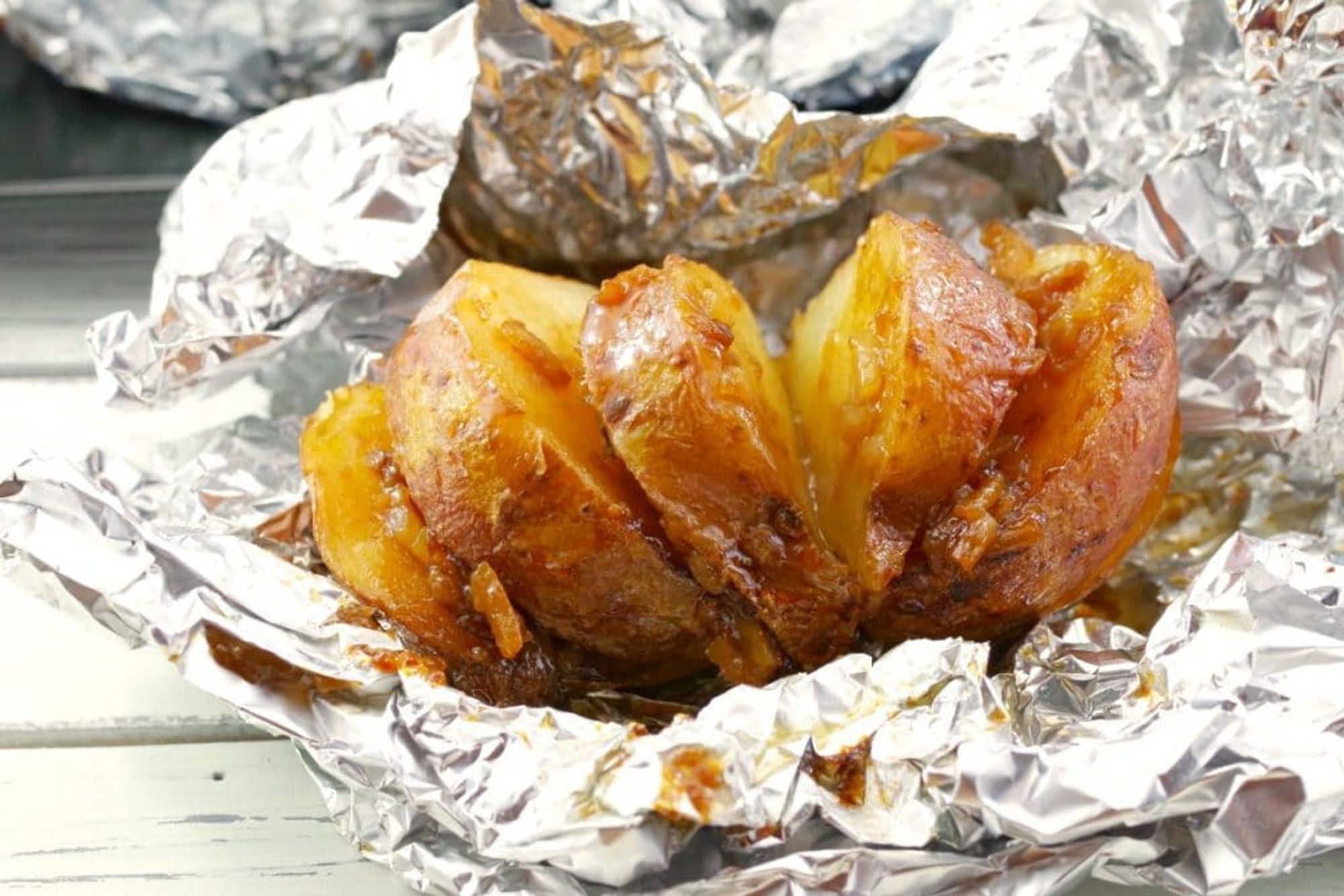 Baked Potatoes In Foil Onion Food Meanderings My Recipe Magic