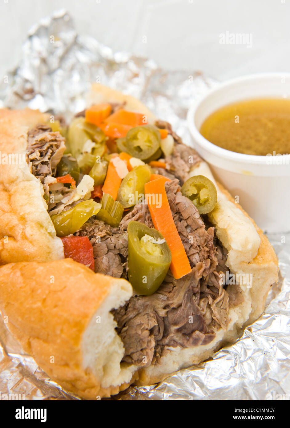 Chicago Style Italian Beef Sandwich With Giardiniera And Dipping Sauce