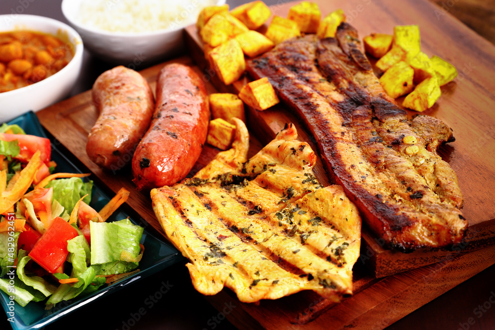 Chicken Beef And Chorizo With Fried Plantains Stock Photo Adobe Stock