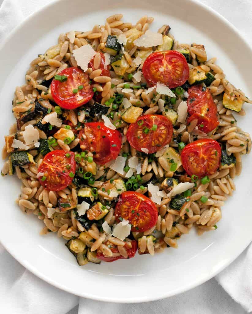 Chicken Over Orzo Pasta With Zucchini And Tomato Recipe Hellofresh