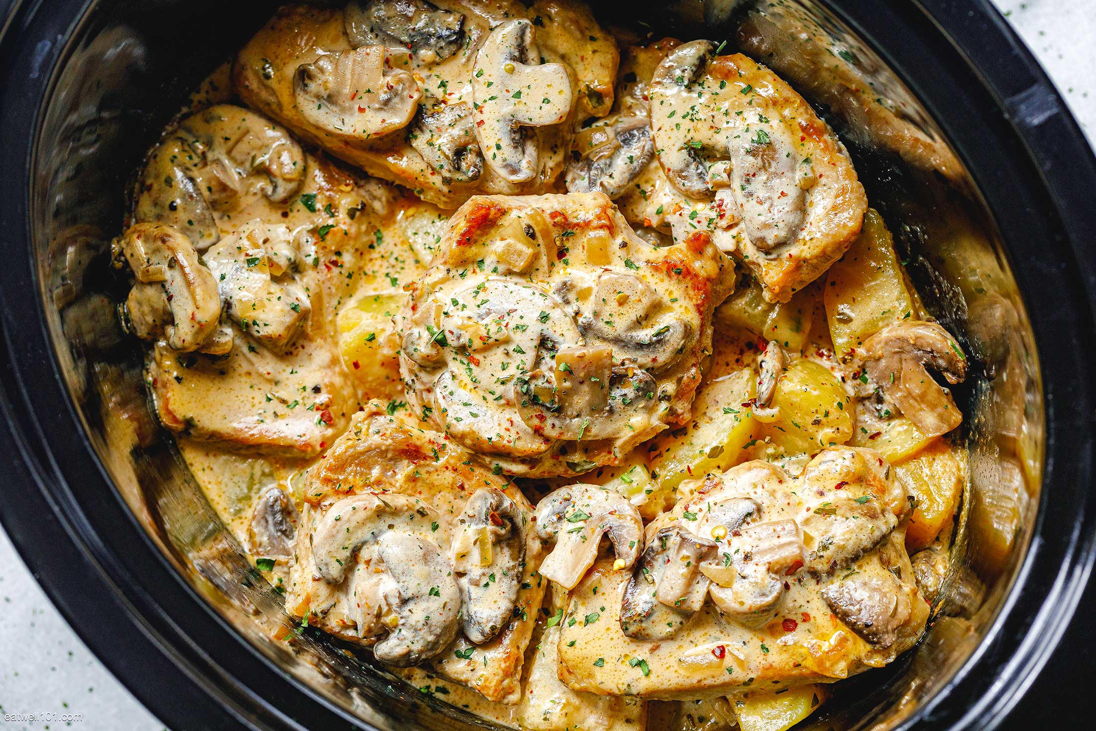 Crockpot Creamy Garlic Pork Chops With Mushrooms And Potatoes Crockpot Recipes Slow Cooker