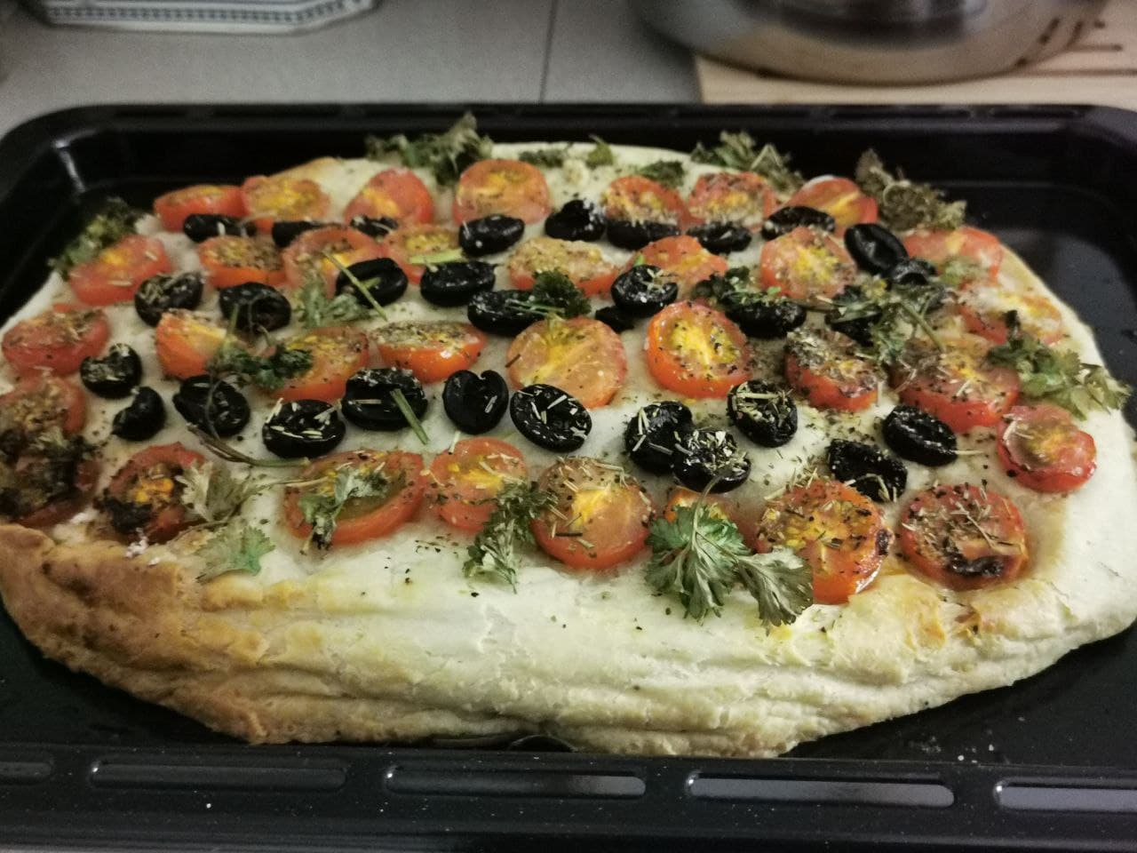 Focaccia Bread With Olives And Tomatoes