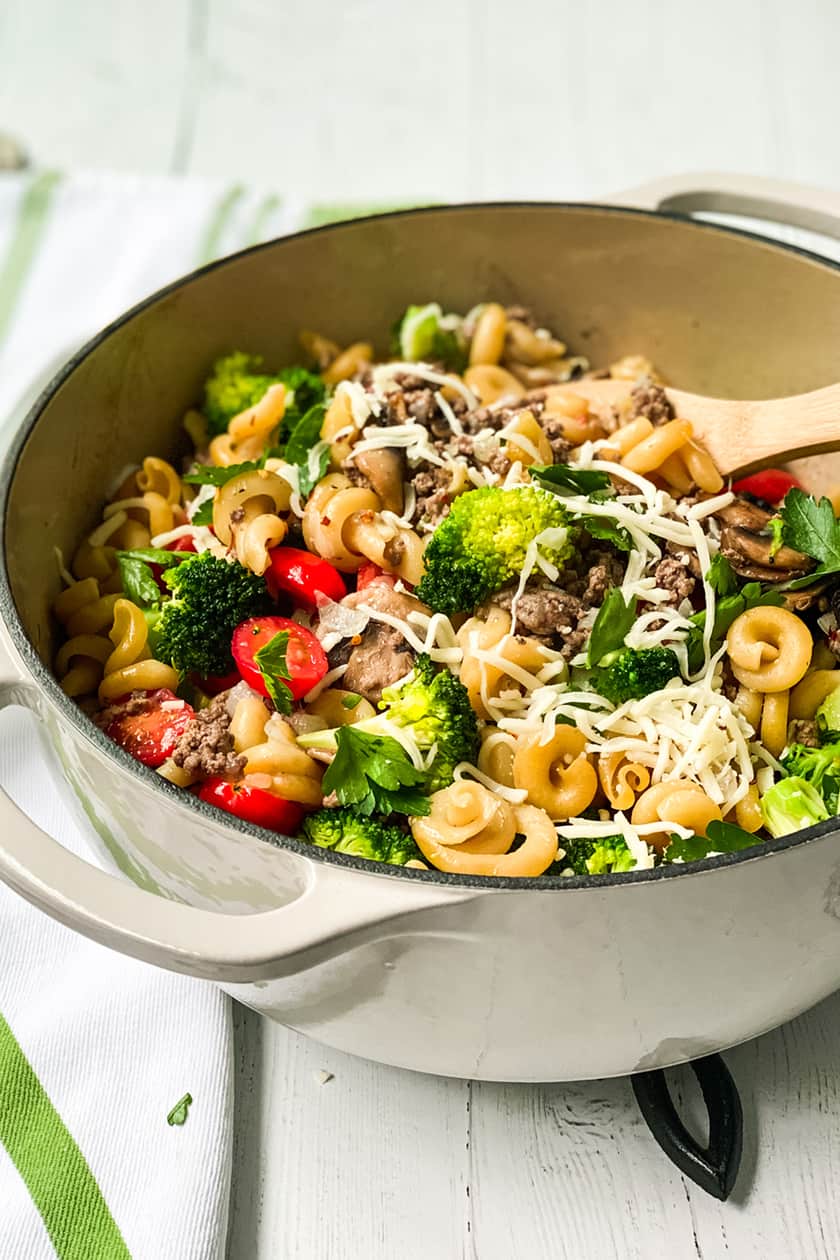 Ground Beef And Broccoli In A Pot With A Wooden Spoon Ground Beef