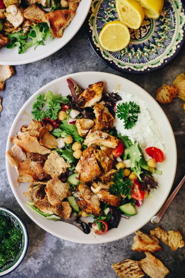 Healthy Chicken Shawarma Bowls With Dressing Drizzled On Top