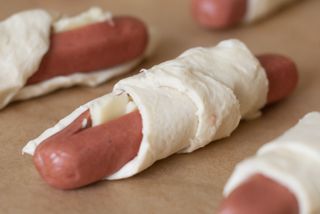 Hot Dogs Wrapped With Crescent Rolls Lightly Brushed With An Egg Wash