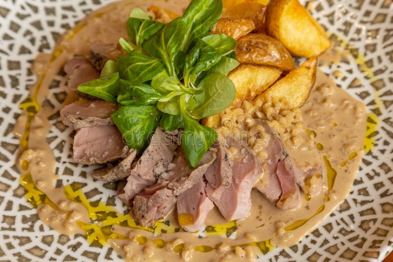 Plate Of Creamy Beef Stew With Fries And Herbs Stock Image Image Of