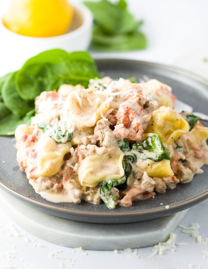 Savory Cheese Filled Tortellini In A Simple Cream Sauce With Tomatoes