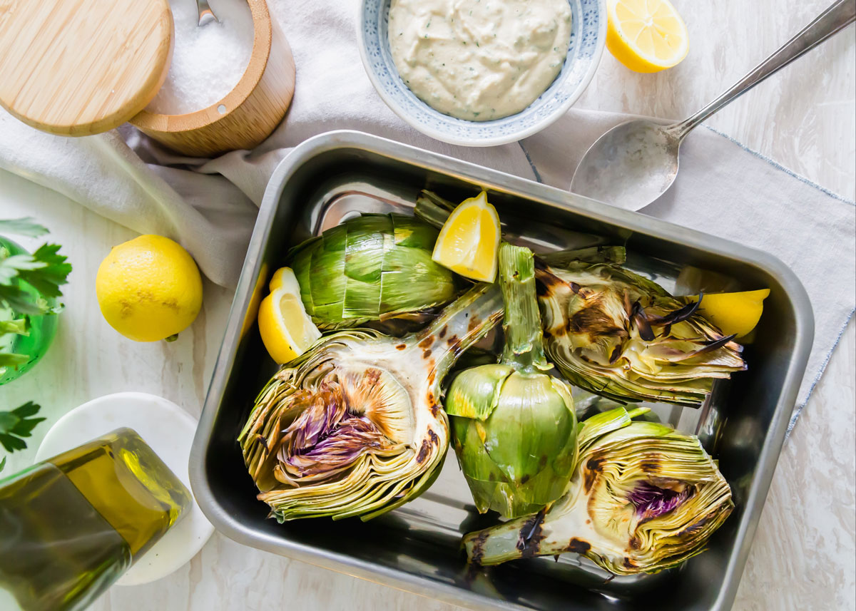 Simple Grilled Artichokes With Lemon Herb Tahini Dipping Sauce