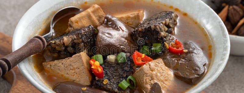 Spicy Duck Blood Jelly Soup And Stinky Tofu With Scallion And Chili