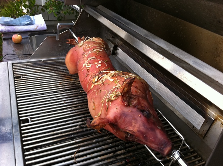 Spit Roasted Pig On The Barbecue Pig Roast Pig Roast Recipes Spit Roast