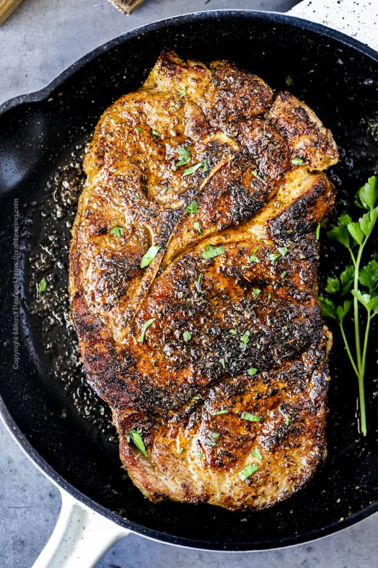 Steak In A Skillet With Herbs And Spices