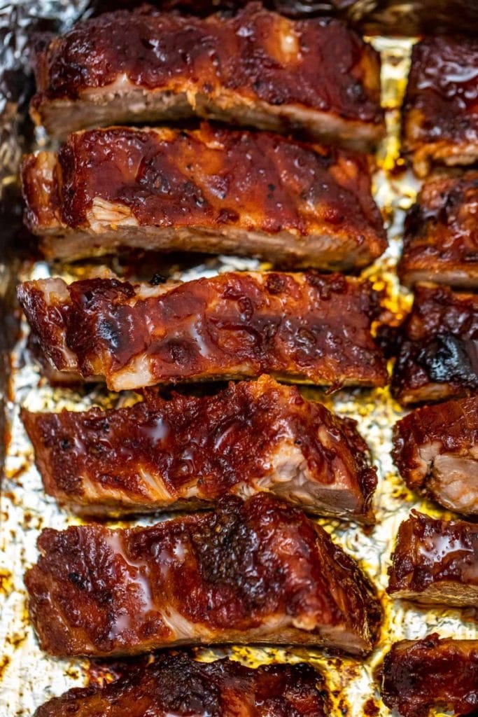 Tender Oven Baked Bbq Ribs That Fall Off The Bone Scrambled Chefs