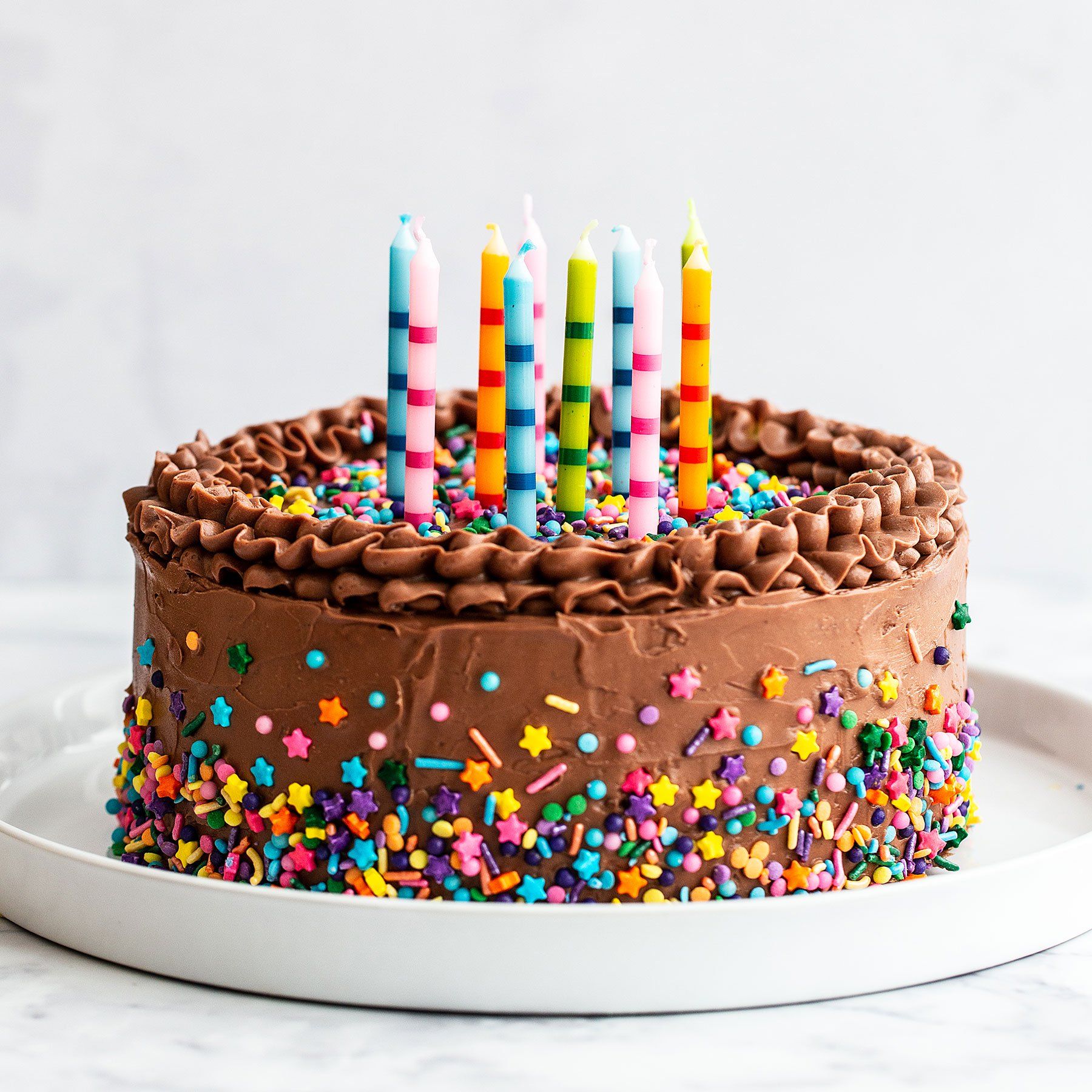 The Best Birthday Cake Recipe Has A Moist And Fluffy Yellow Cake Paired