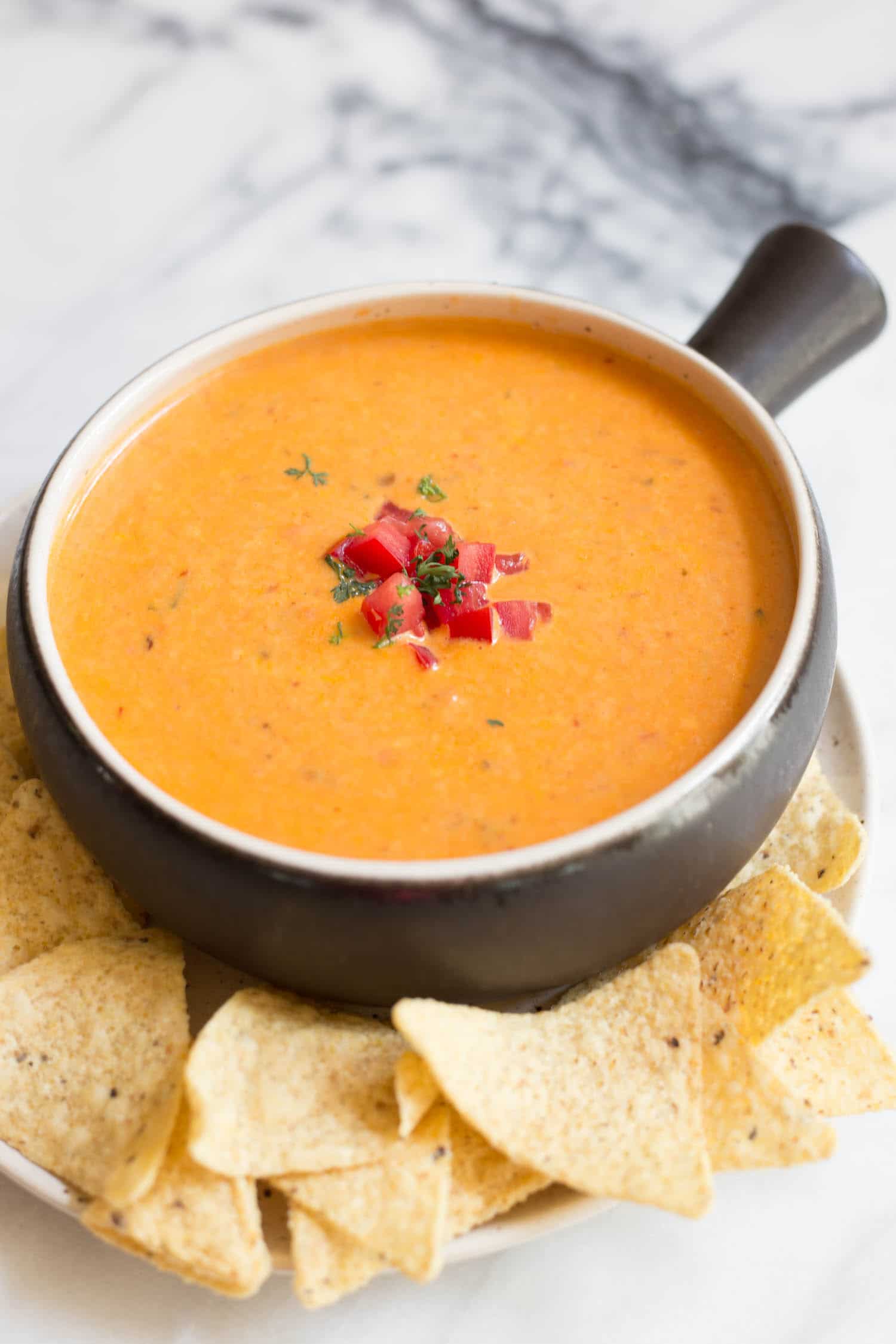 The Simple Spicy Way To Jazz Up Jarred Queso Dip