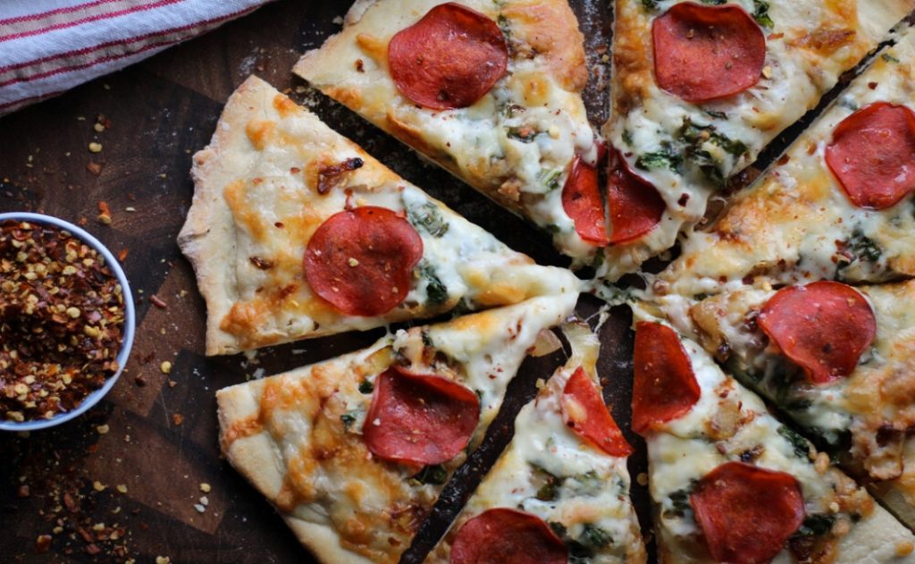 Turkey Pepperoni Pizza With Caramelized Onions And Wilted Kale Canadian Turkey