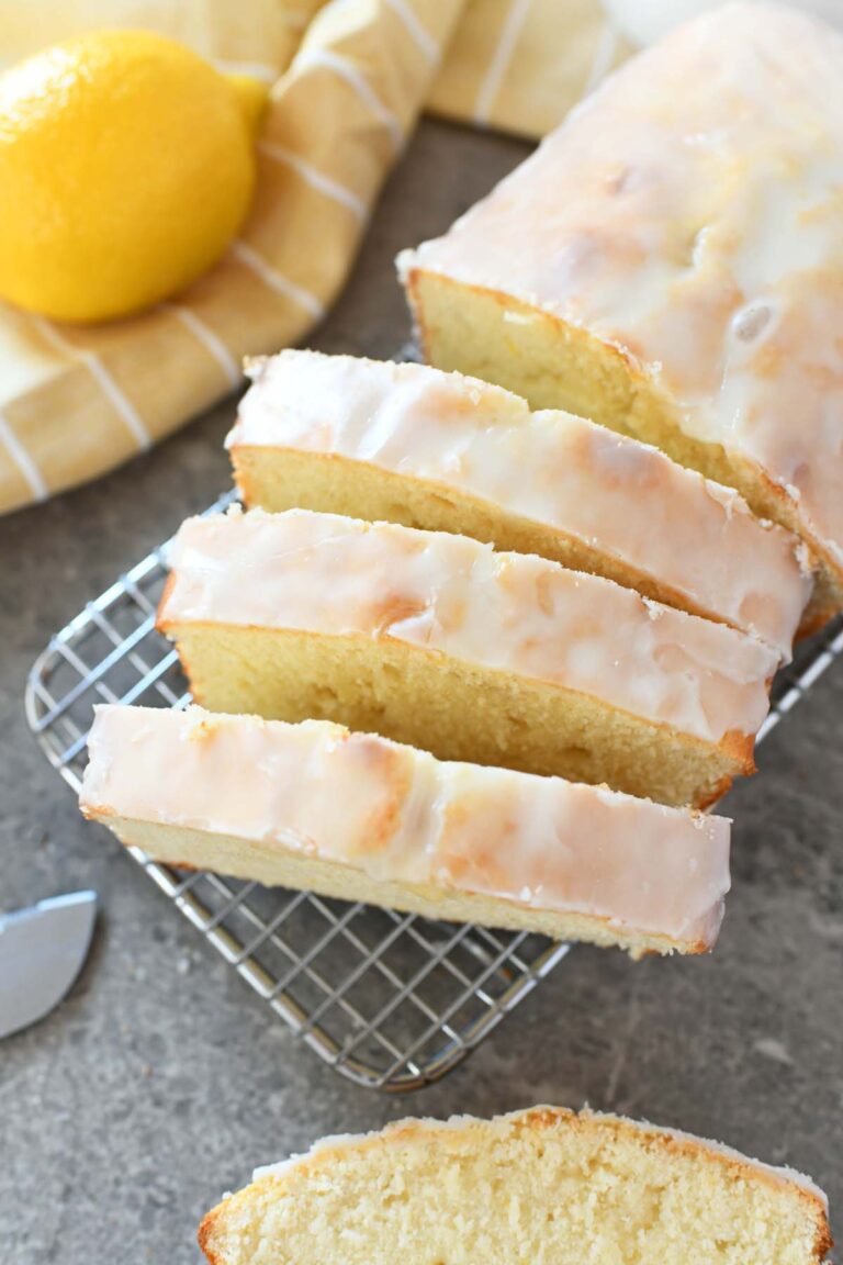 Two Slices Of Lemon Pound Cake On A White Plate With The Words How To Make An Iced Lemon Pound