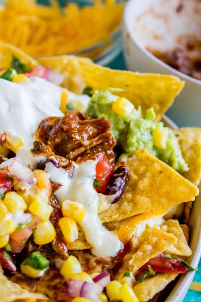 Ultimate Chili Nachos With Queso And Guacamole The Food Charlatan